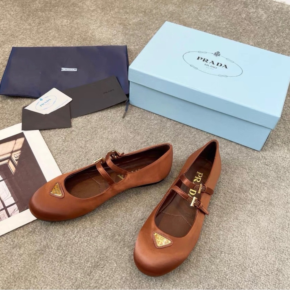 Prada Women's Brown Leather Flats with Gold Details